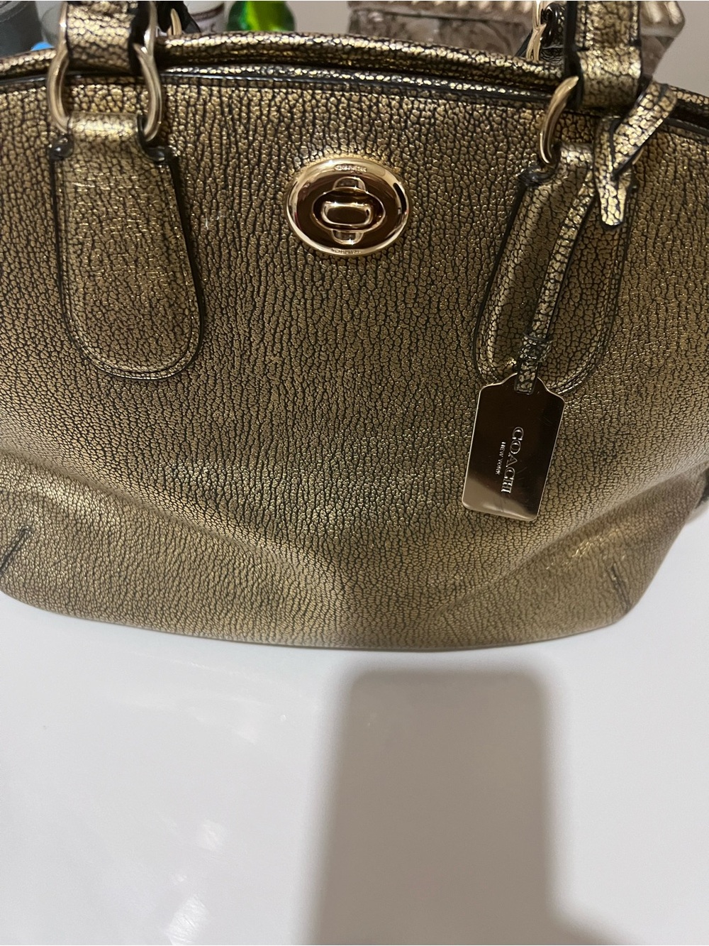 Coach Vintage
Metallic Gold Pebbled Leather Tote
